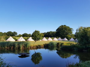 Bell Tents by a Lake