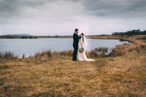 Bride and Groom by a Lake